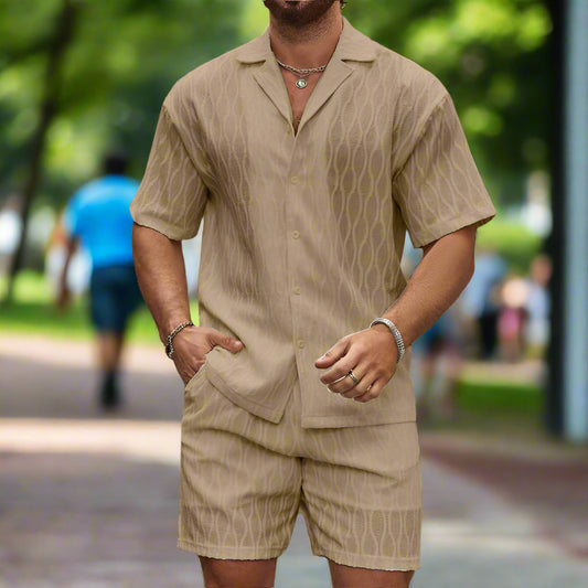 Man wearing a breezy two-piece set with a short-sleeve notched-collar shirt and matching shorts, perfect for warm weather